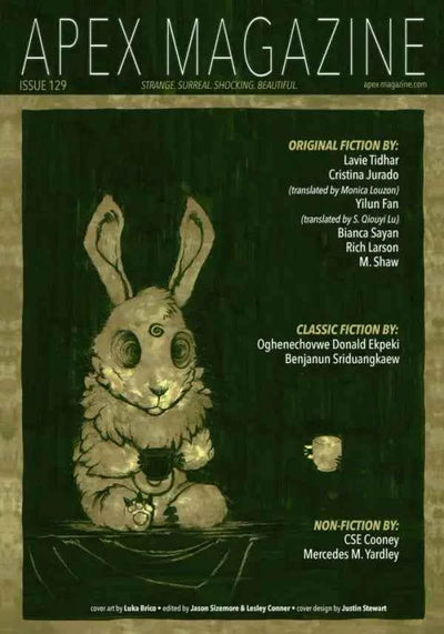 Apex Magazine Issue 129 features a cover with a large white rabbit with glowing green eyes holding a teacup at a table. The cover text highlights featured authors of both short fiction and non-fiction inside.
