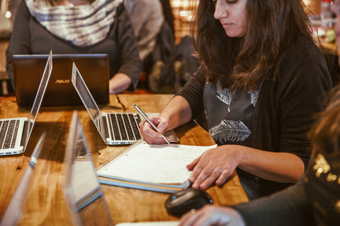Woman learning via her laptop computer.