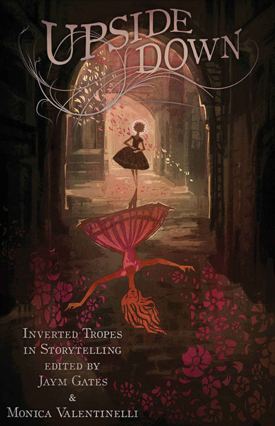 Book cover for Upside Down: Inverted Tropes in Storytelling features a girl in a dress standing upright, her upside-down reflection falling below and surrounded by flowers—a vivid image for this anthology.