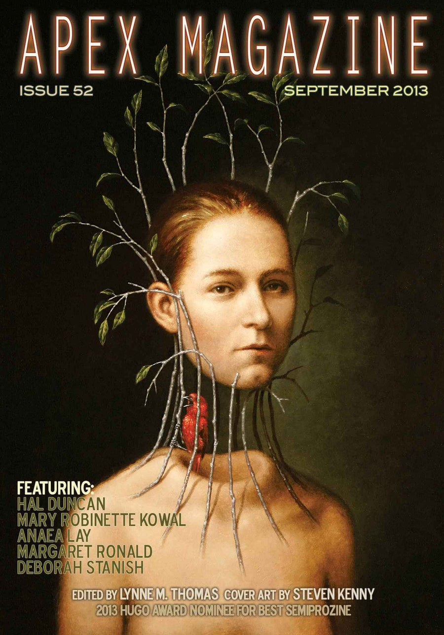 Apex Magazine Issue 52, a DRM-free science fiction magazine, showcases a dark cover with a woman emerging from branches and a red heart among them. Also features Blood on Vellum and other story highlights.